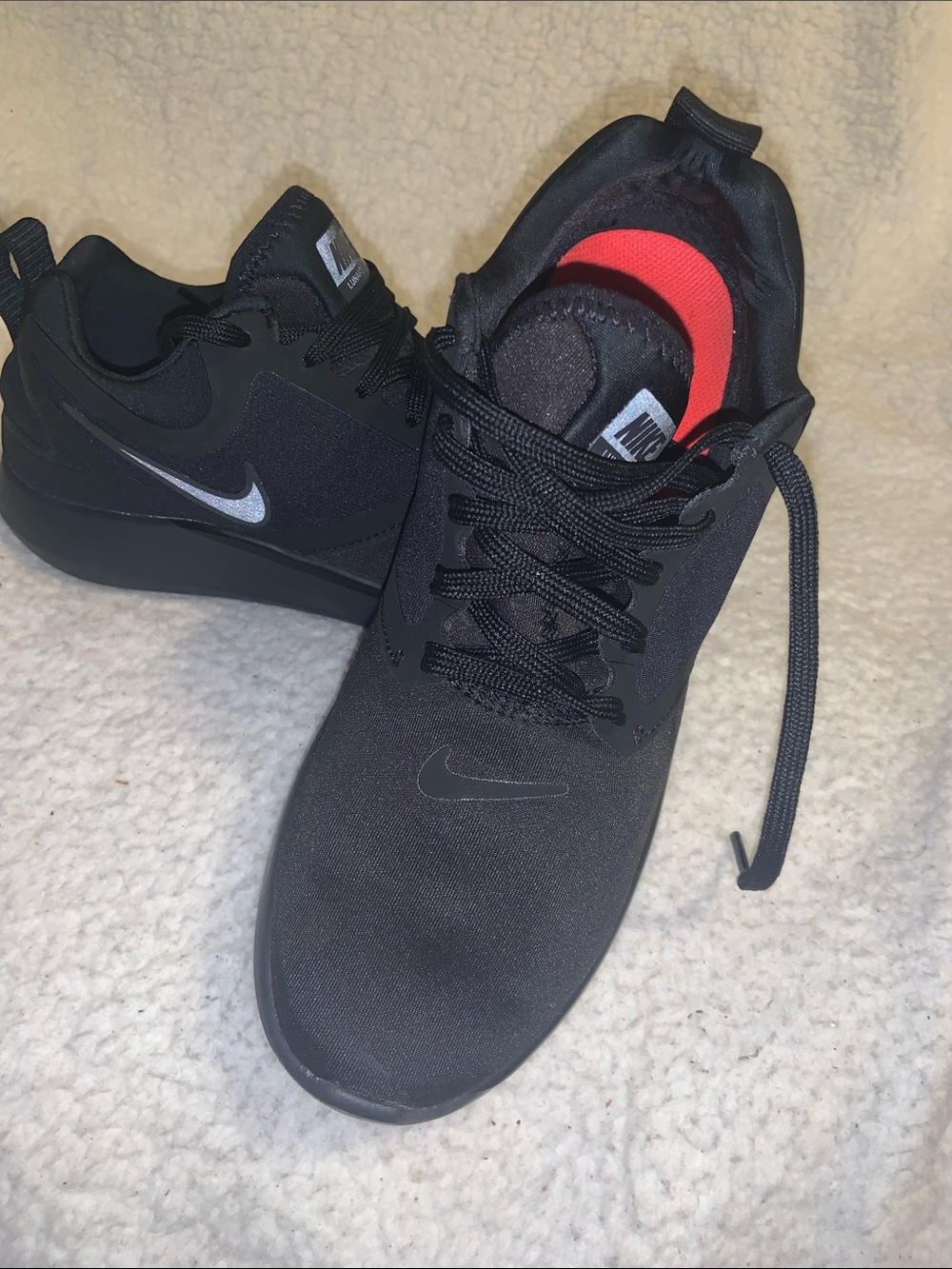 Nike LunarSolo Ladies Black Sneakers with Red Insole Accent